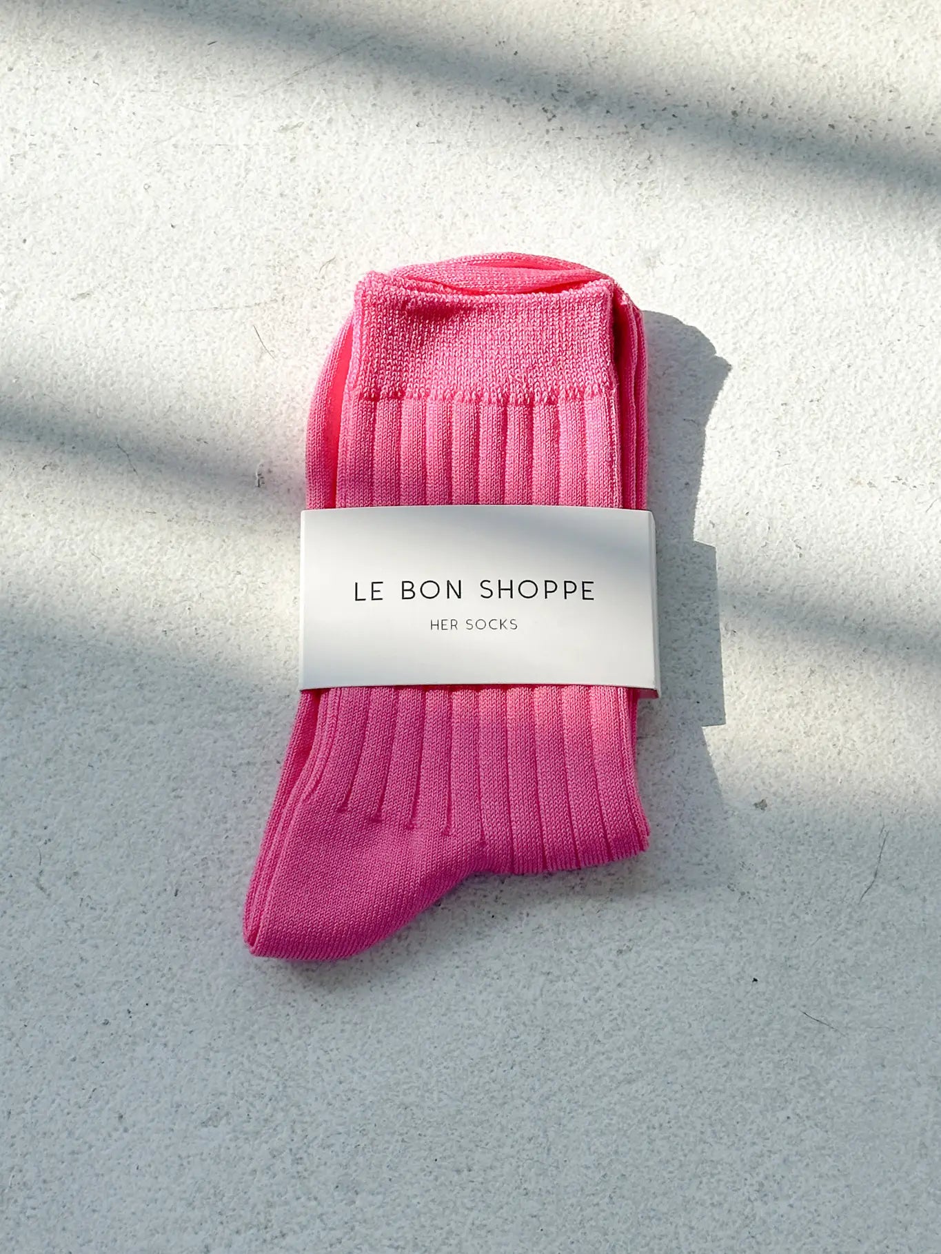Her Socks in Bright Pink