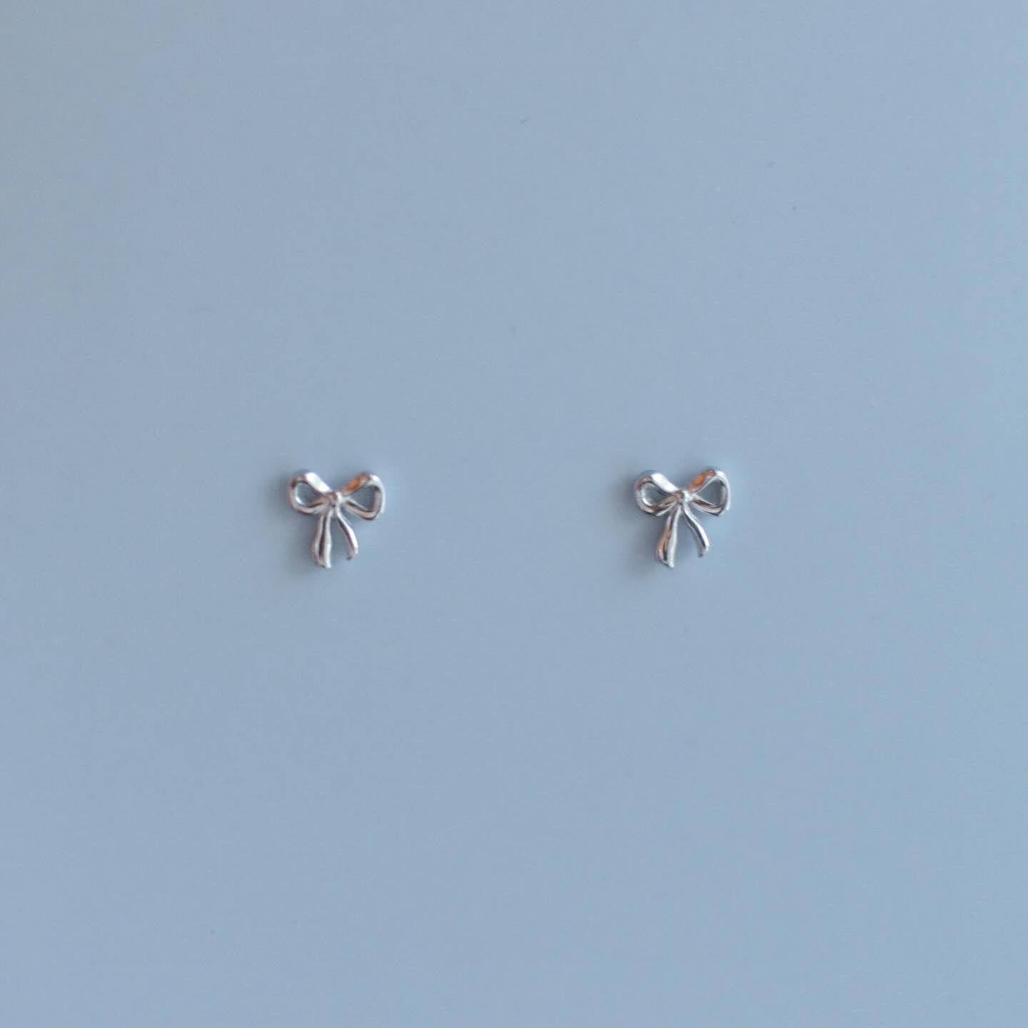 Tiny Bow Studs | Sterling Silver