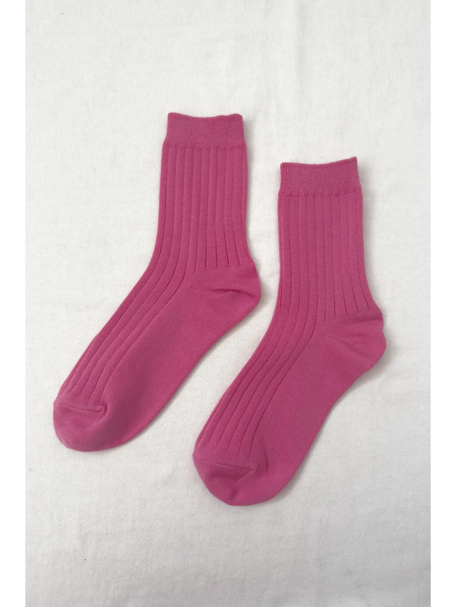 Her Socks in Bright Pink