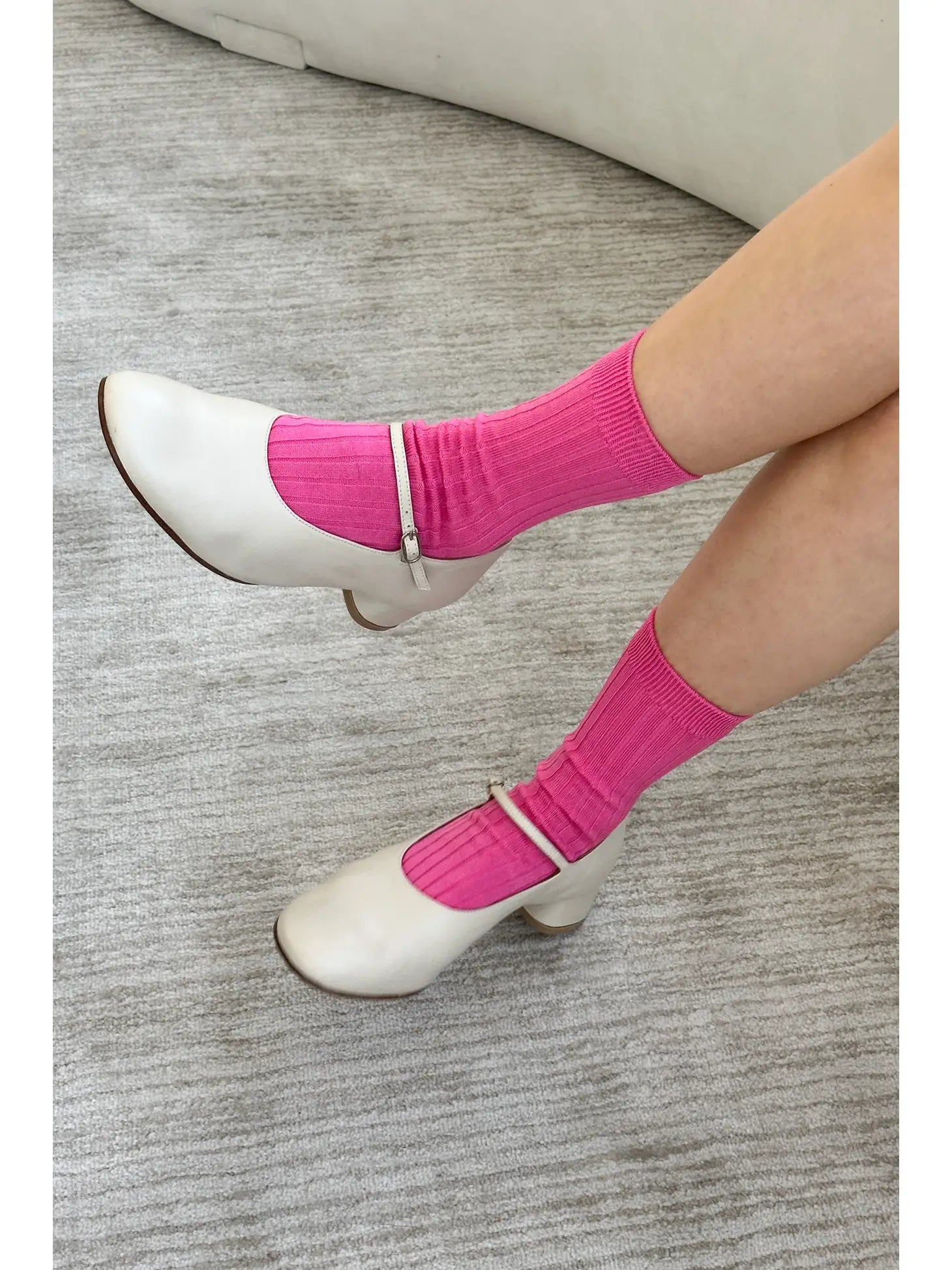 Her Socks in Bright Pink