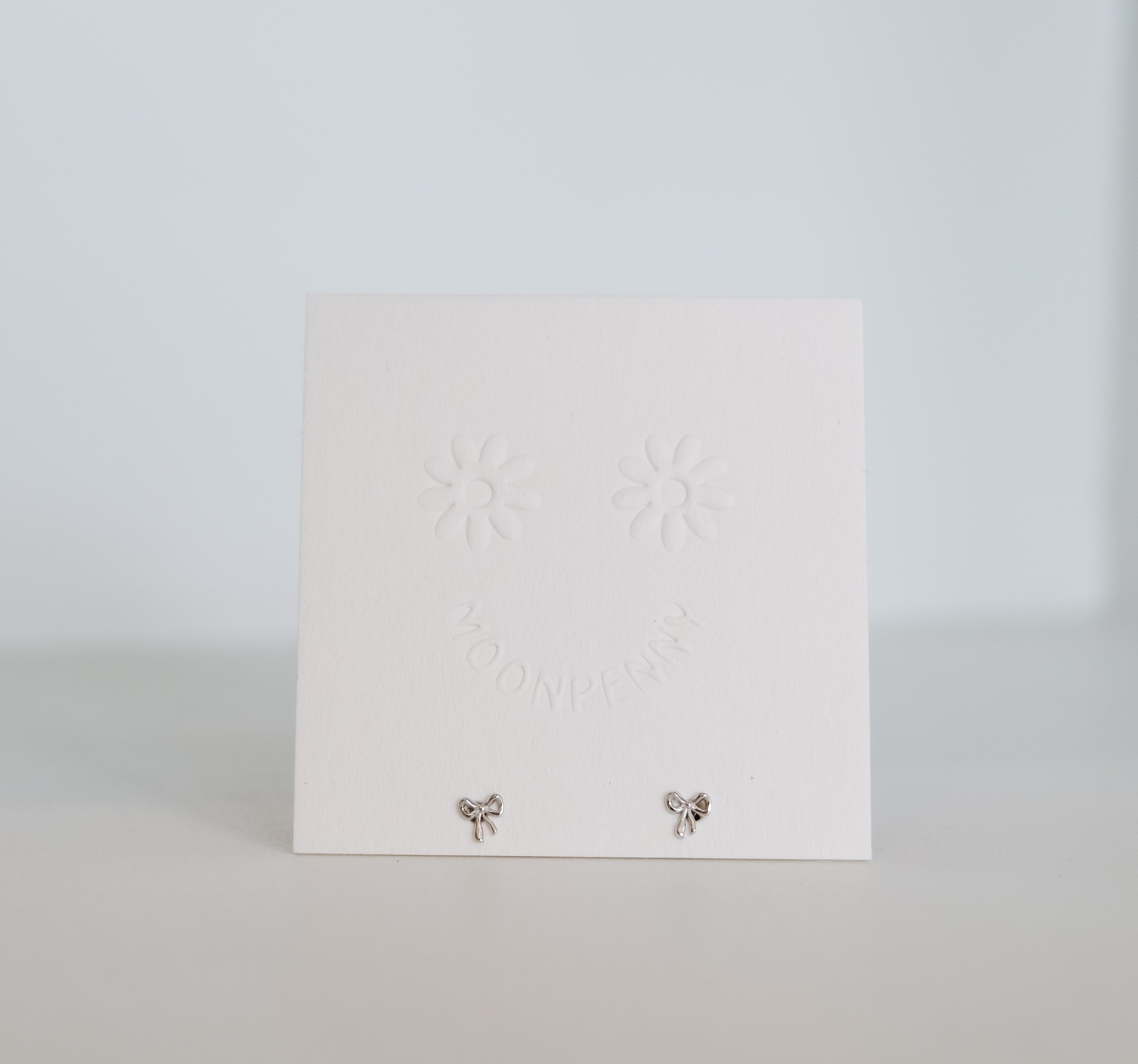 Tiny Bow Studs | Sterling Silver